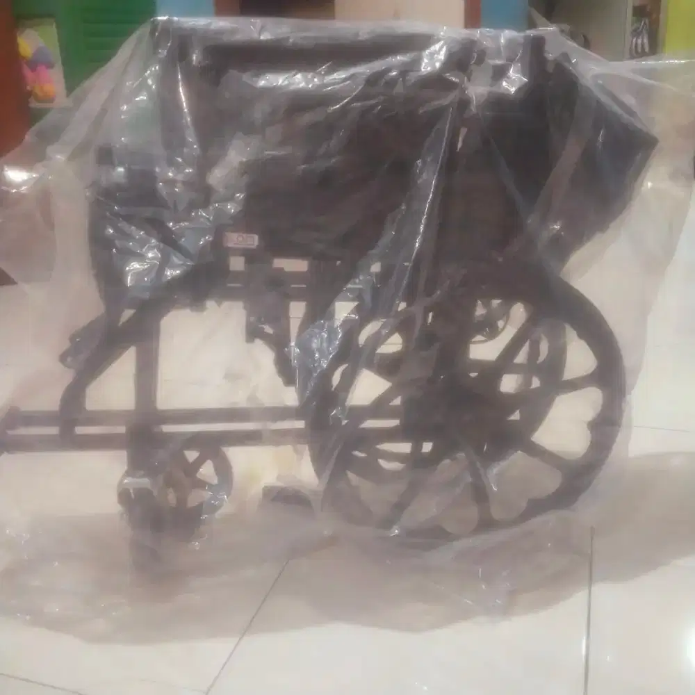 kursi roda merk glom