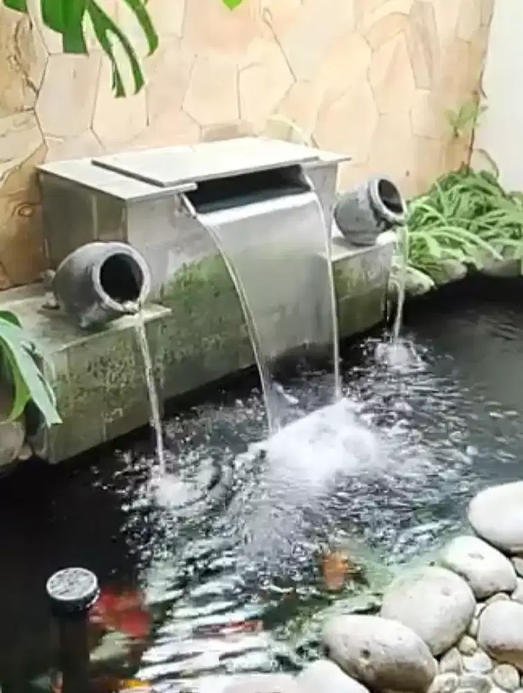Tukang kolam air terjun