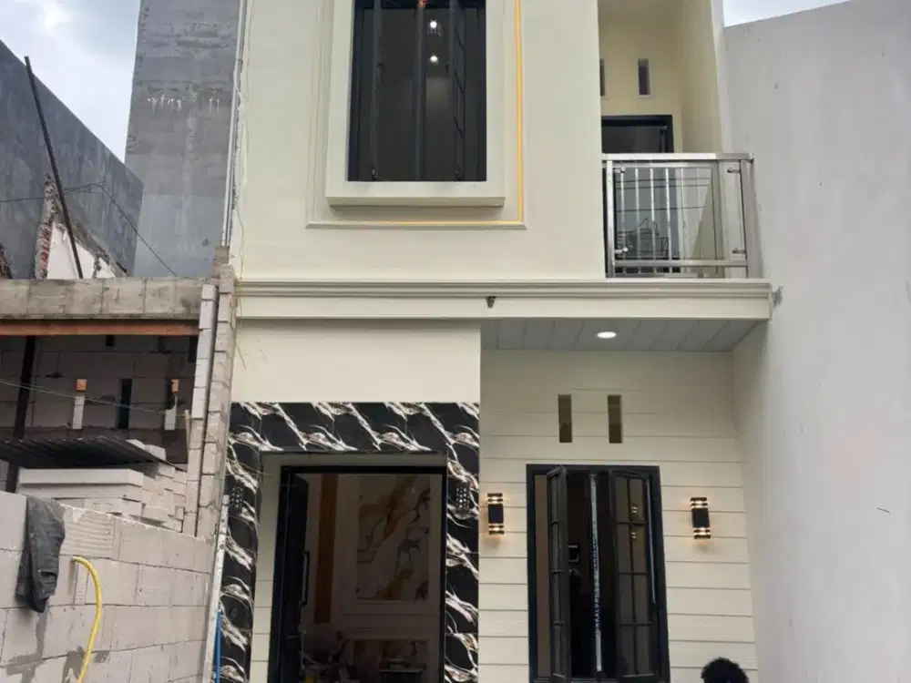 RUMAH BARU PLOSO TIMUR MODERN TROPIS