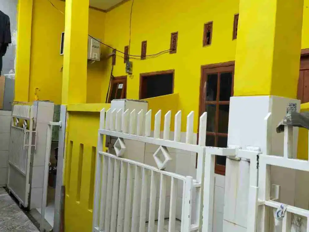 rumah kontrakan 5 pintu di belakang cluster kuta candrabaga pondok ungu bekasi