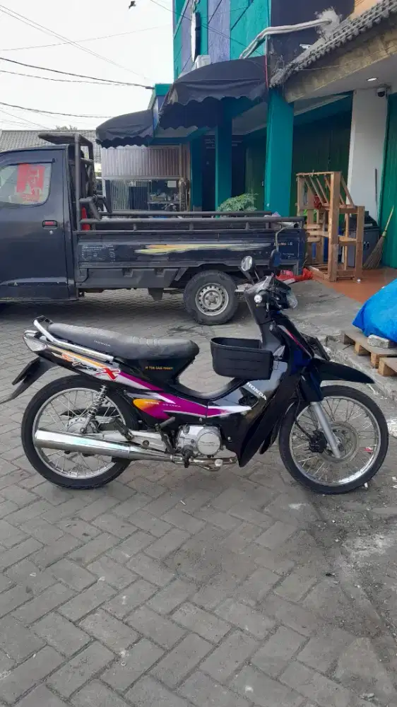 Supra x 100 Tahun 2003