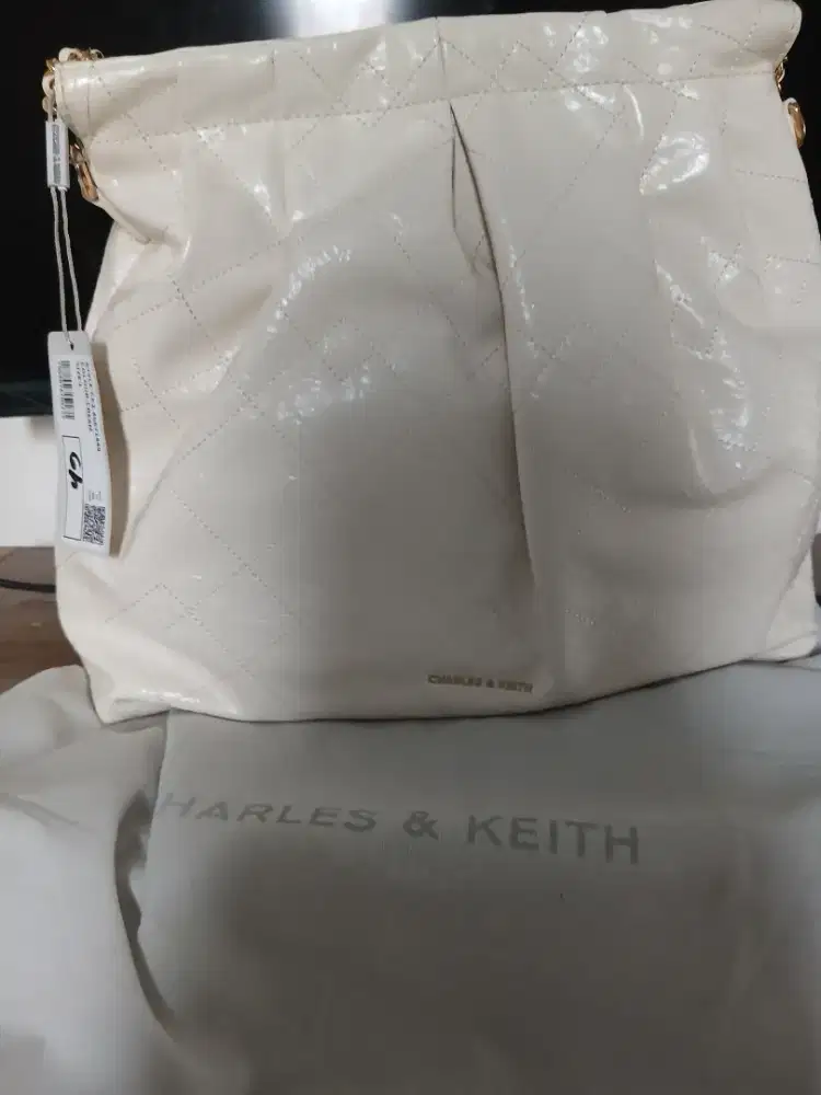 Tas charles kheith