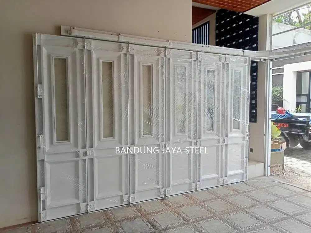 Layanan pasang service pintu garasi henderson sliding / lipat bandung