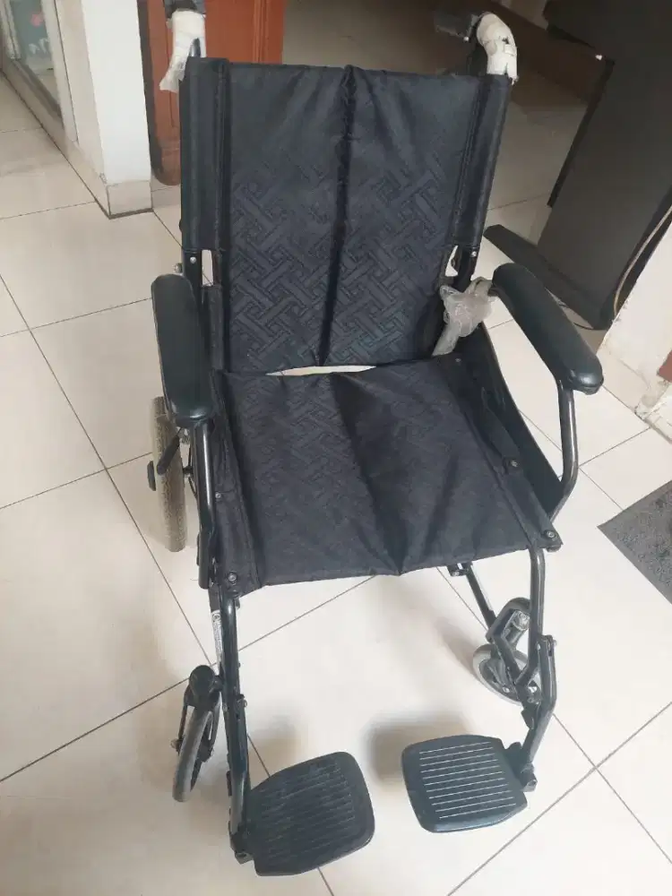Kursi roda travelling
