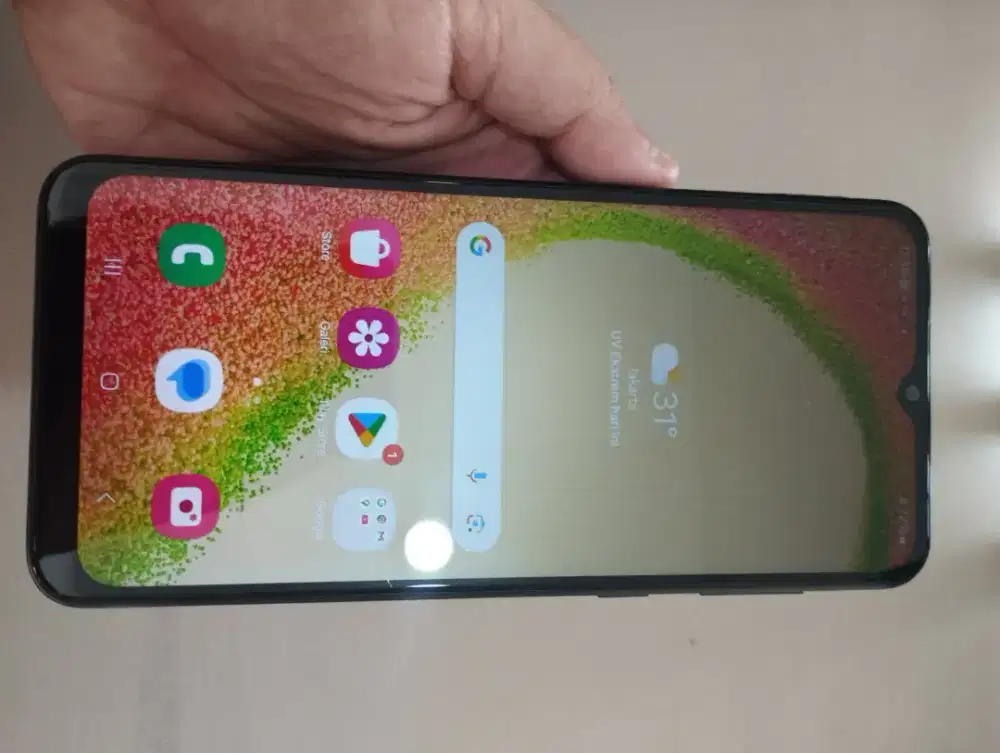Samsung A04-4G.ram 4/64GB.ORI.GOLDEN PONSEL