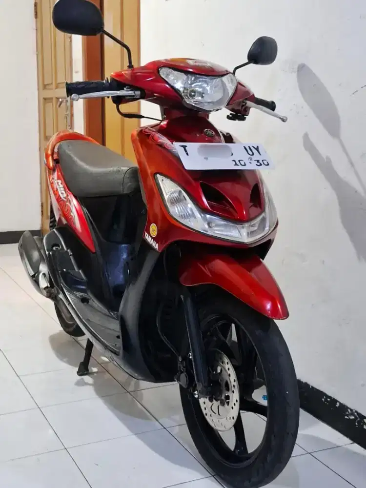 Mio smile tahun 2009 merah marun