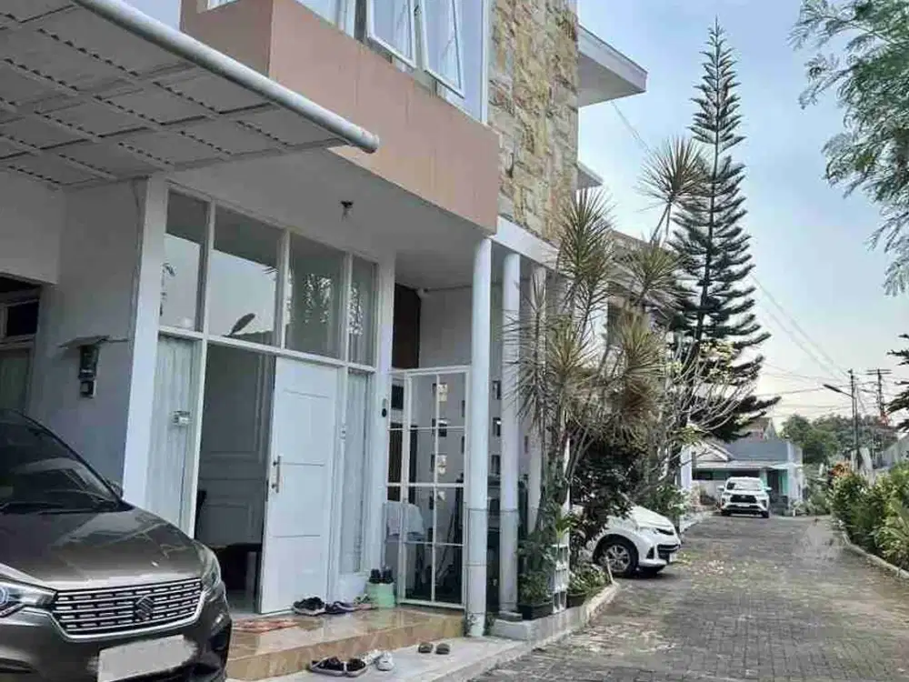 Rumah Modern Luas 89 m² di Cluster Area Jalan Ikan Piranha Tunjungsekar Malang.