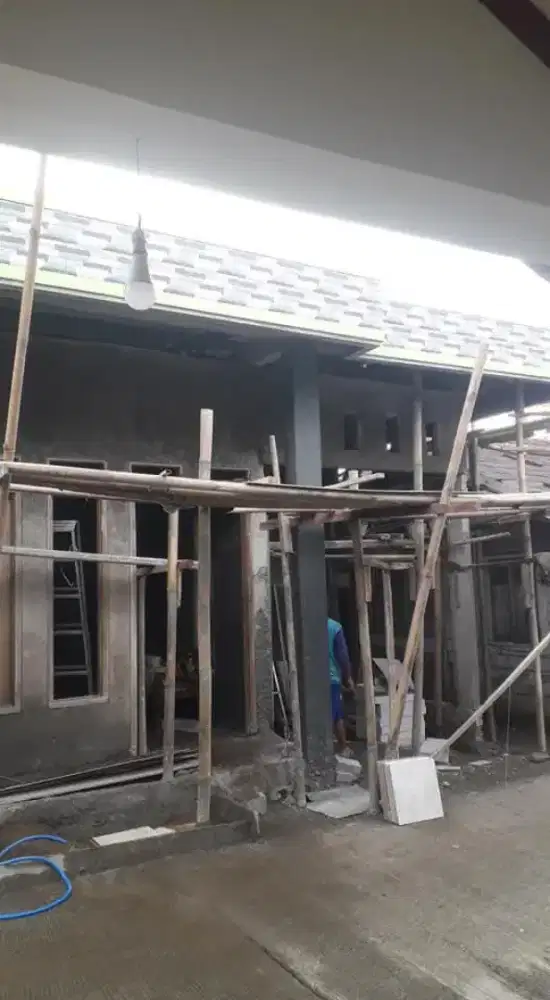 Tukang bangunan borongan/harian