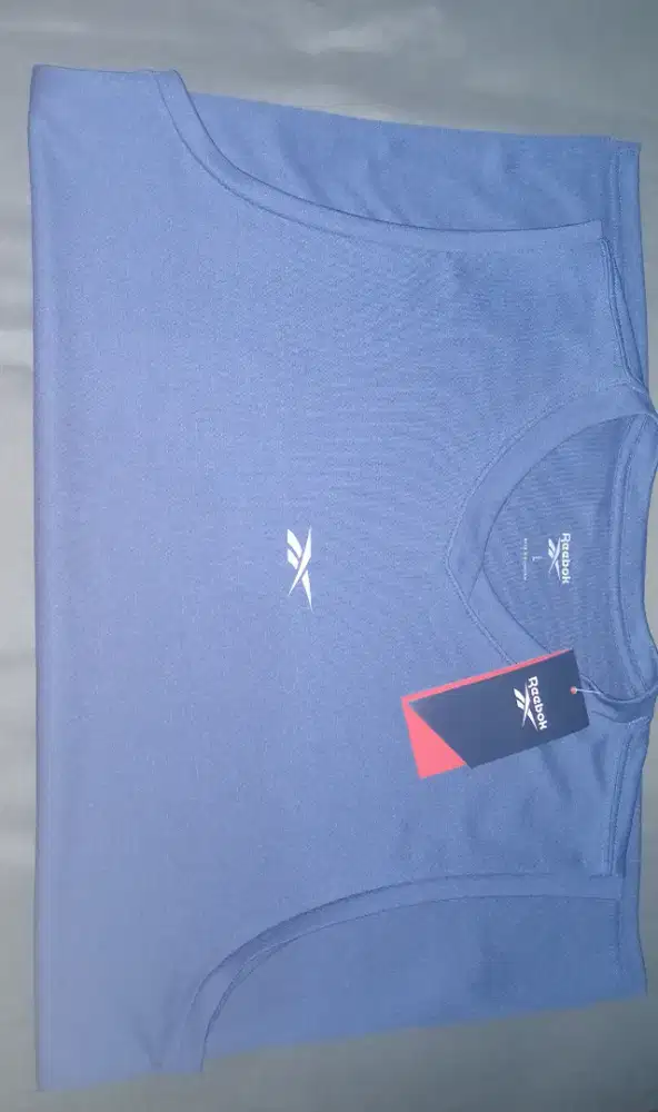 Kaos running reebok ori,