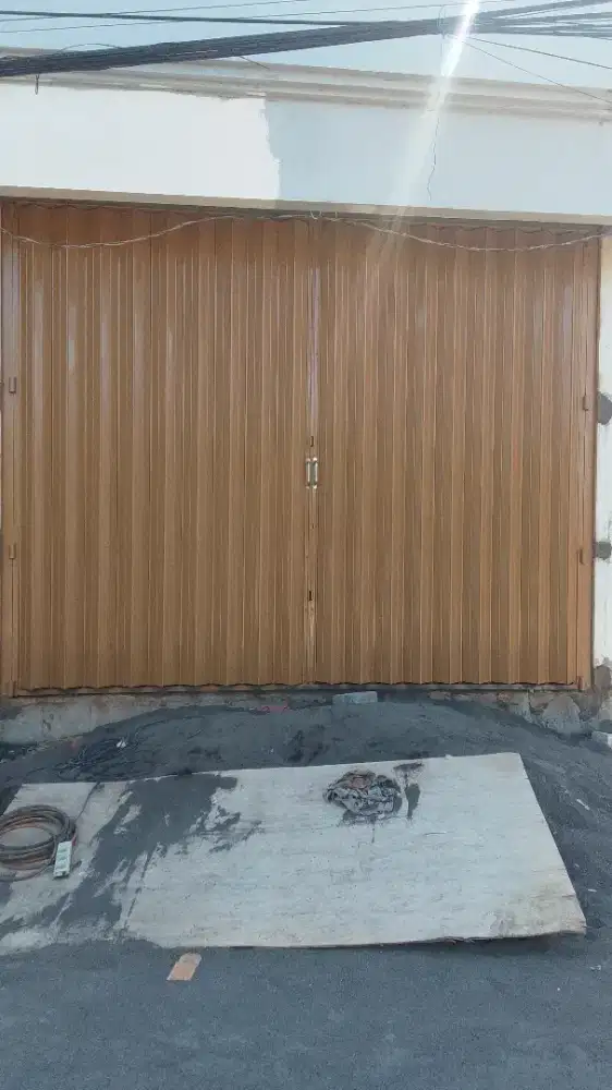 Mengerjakan jasa pintu harmonika