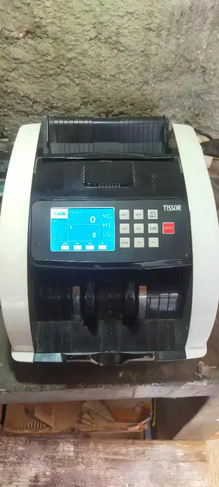 Mesin hitung uang kasir Tissor