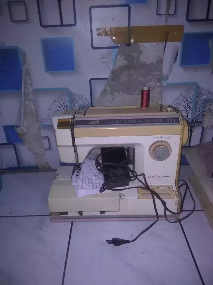 Mesin zigzag vortibel