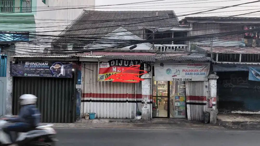 Di jual tanah dengan bangunan di atas nya.