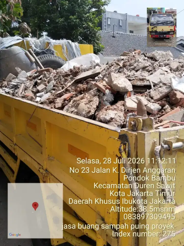Buang puing dan tanah
