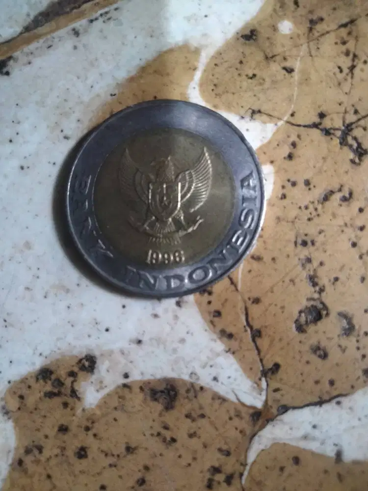UANG KOIN 1000 KELAPA SAWIT