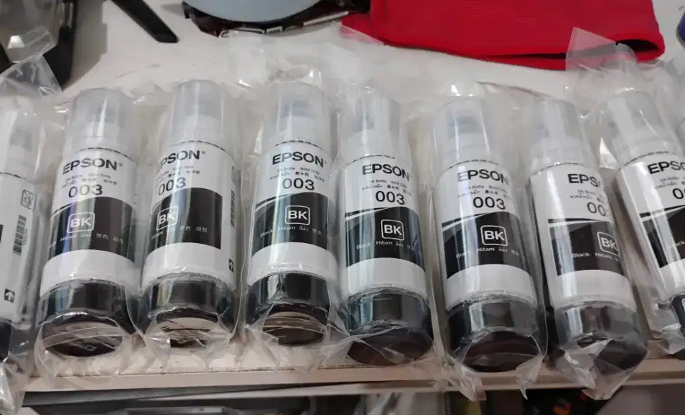 Tinta epson 003 original bawaan printer