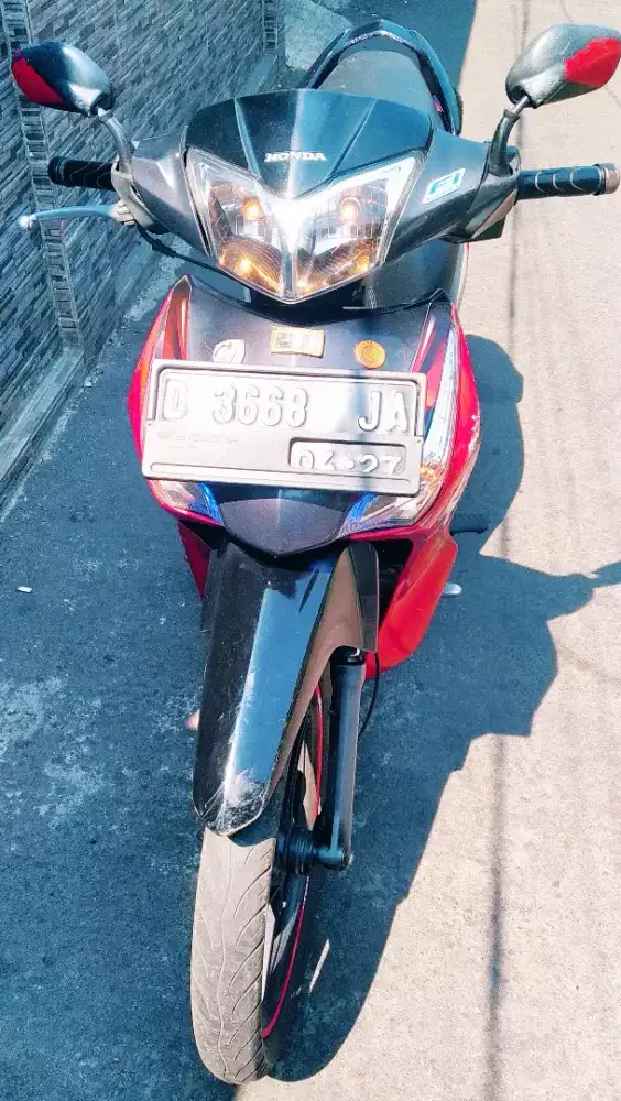 HONDA SUPRA X 125 HELM IN FUEL INJECTION