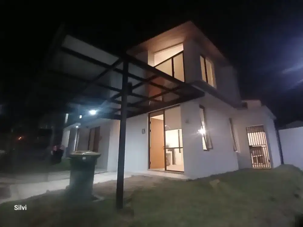 Dikontrakkan rumah + Prabot di Holland Village Manado