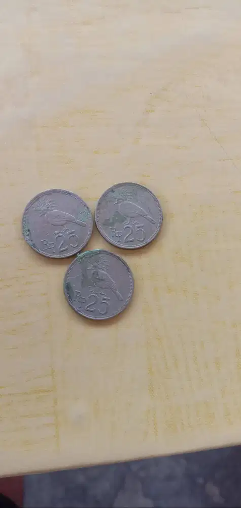 Punya uwang logam thun 1971 rp 25.  Ada 3. Koin