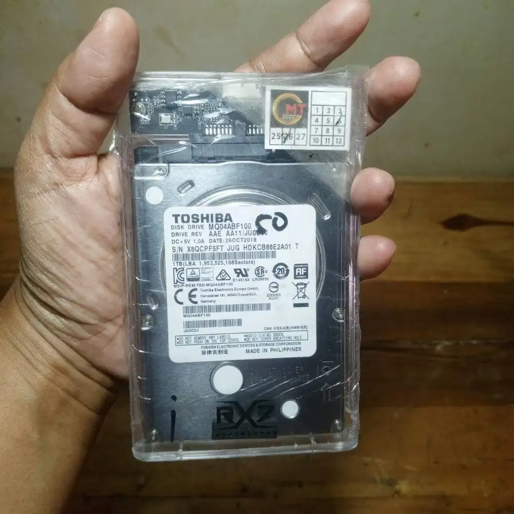 Hard disk eksternal HDD 1 TB Toshiba sentinel 50%