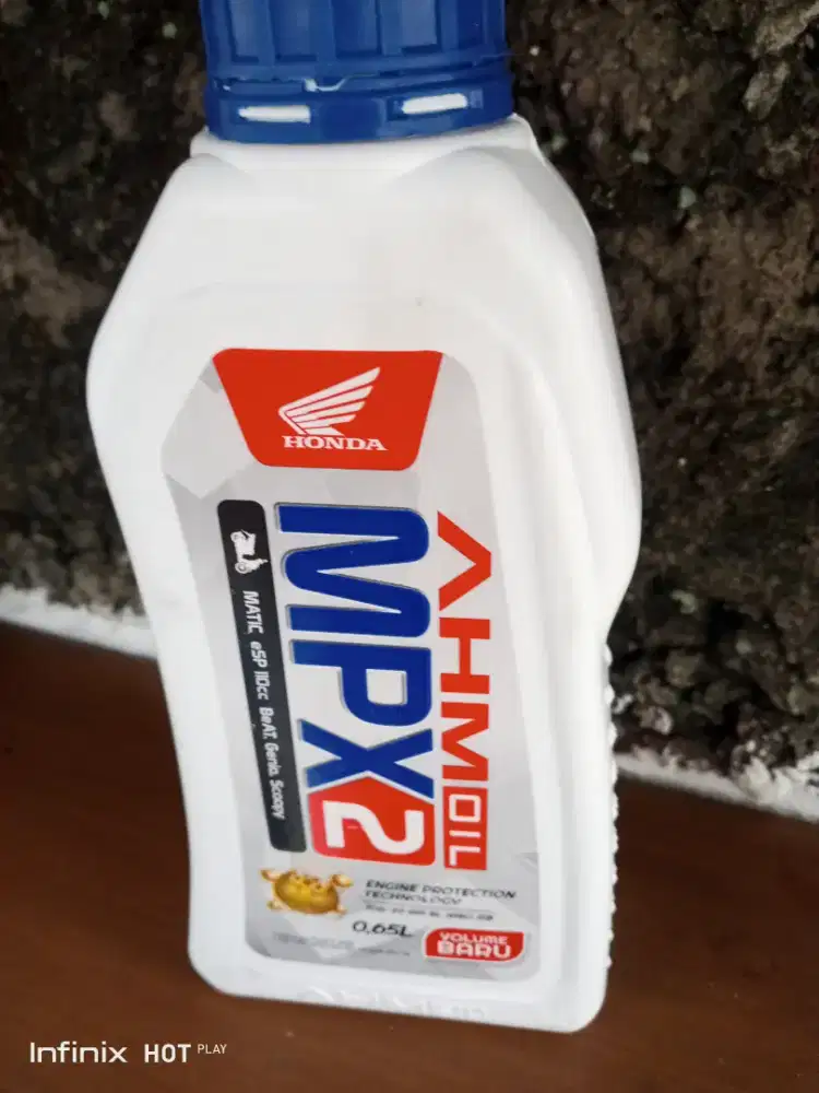 Oli motor metik