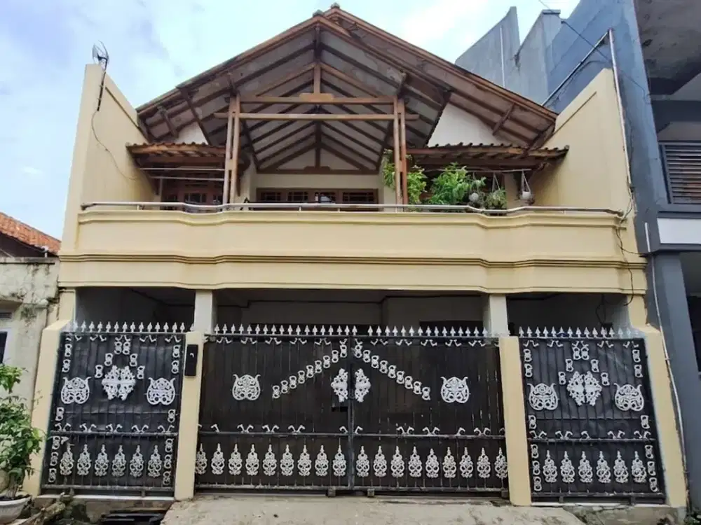 RUMAH DEKAT DENGAN JALAN UTAMA
