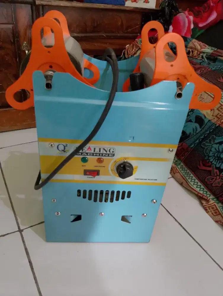 Mesin press cup minuman