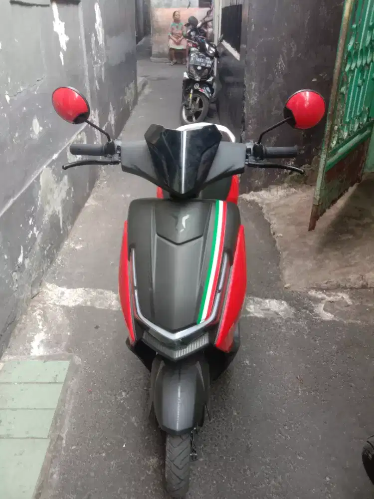 Uwinflay d66b warna merah