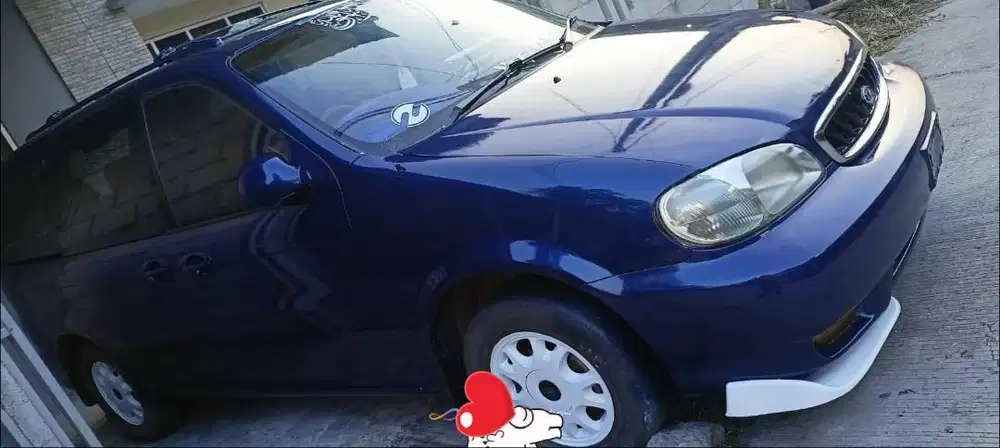 Dijual mobil KIA CARNIVAL AT Tahun 2000 tipe body MPV Warna biru