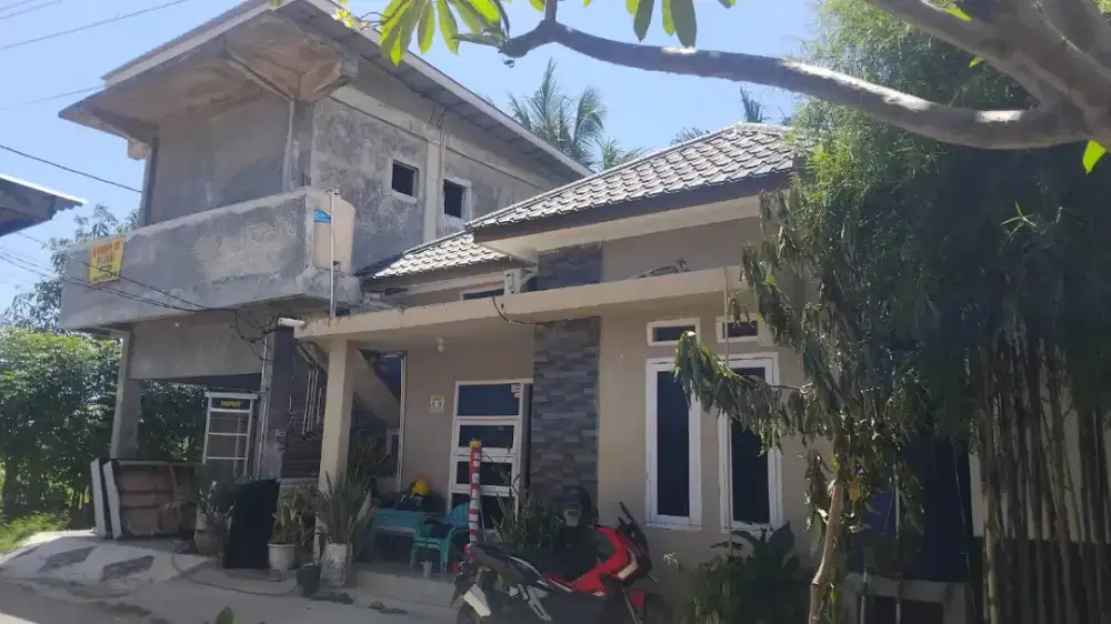 Di jual rumah + bangunan toko
