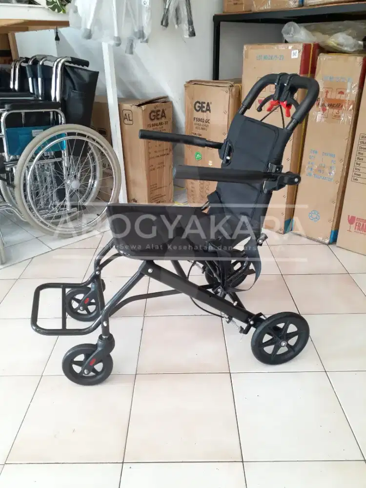 Kursi roda travelling bekas