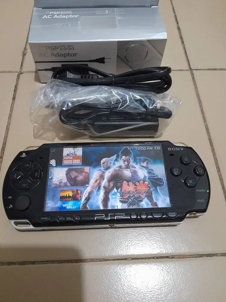 Jual Psp Slim Seri 2000 masih cakep Memory 16gb Full game Plus Cassan