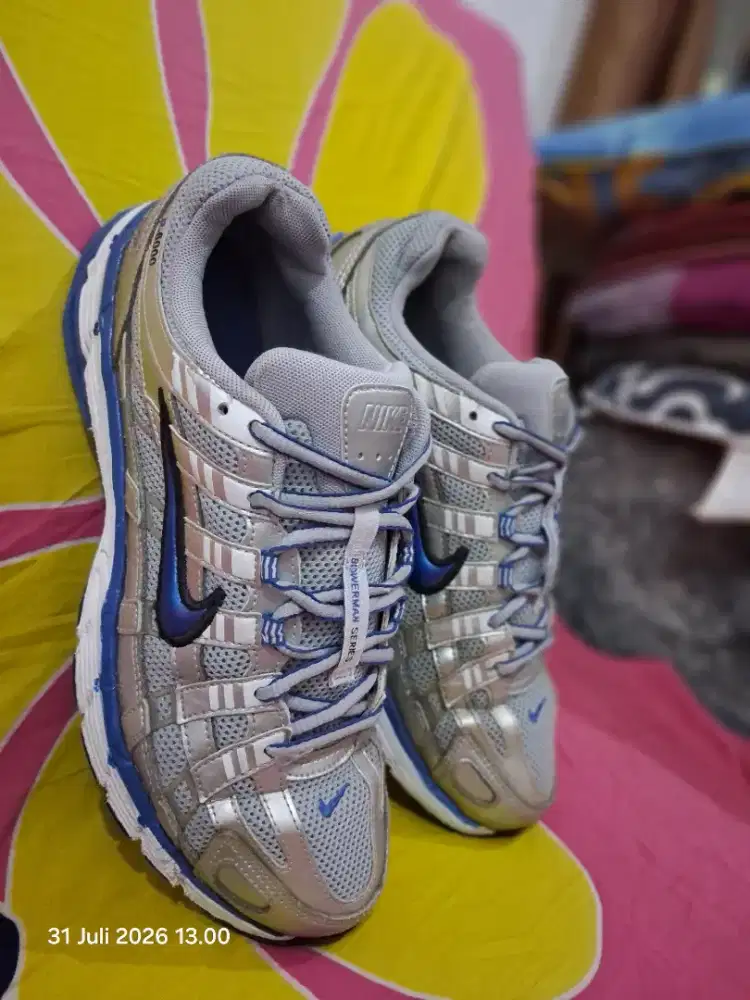 Original Nike P6000 Silver Blue

Size 42 Insole 26,5cm