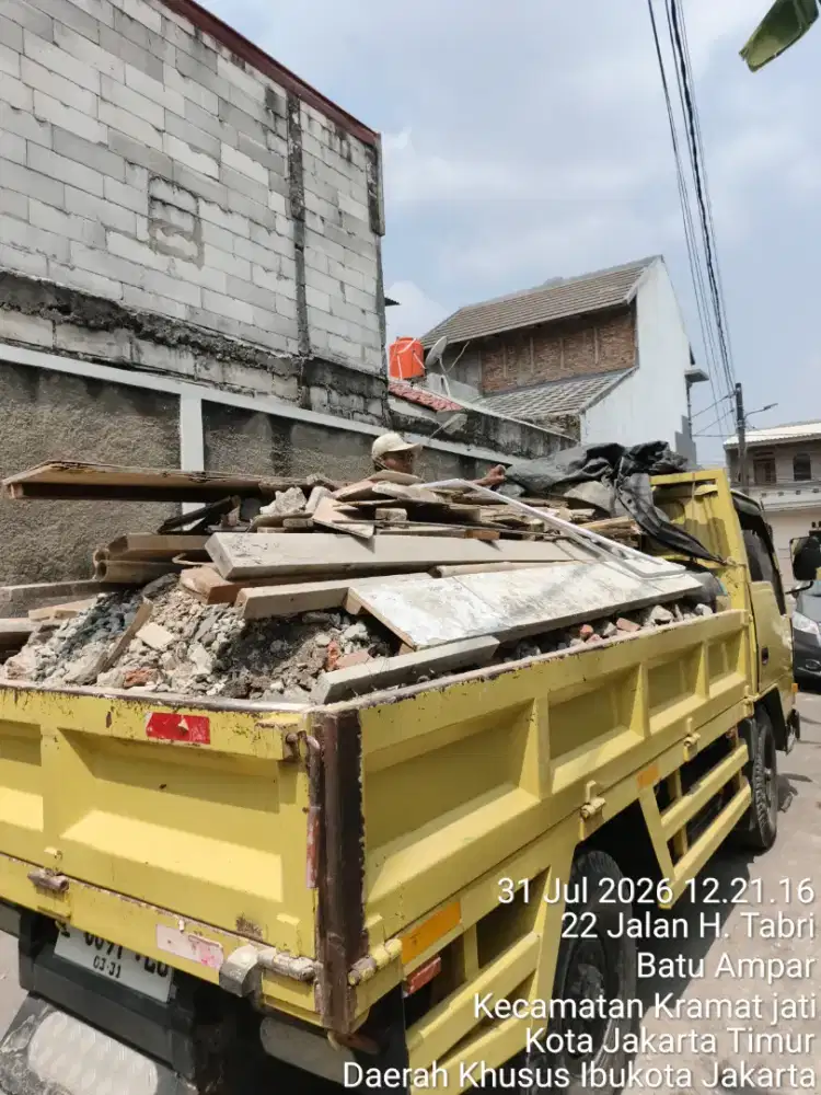 Jasa buang puing tanah