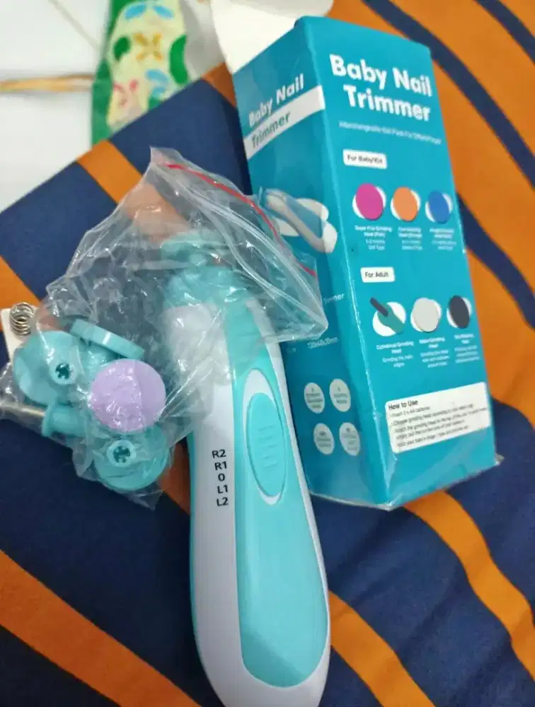 Gunting kuku bayi elektrik