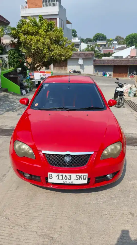 Proton gen2 2010 warna merah