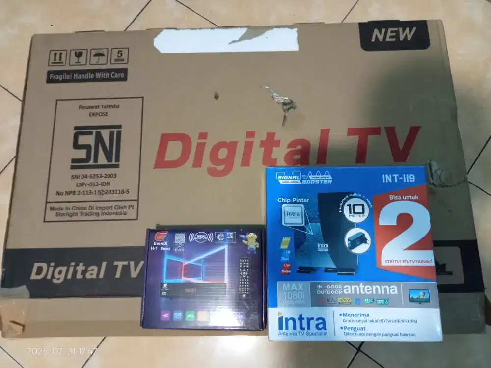 Televisi lengkap antena intra dan resiver evinix tingal pakai
