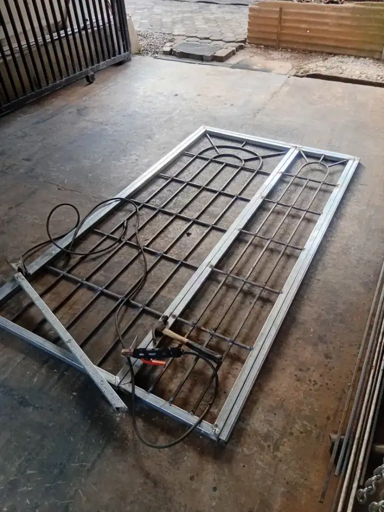 Teralis pintu jendela dan pagar
