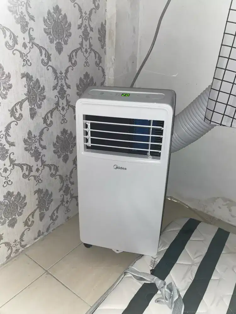 AC portabel Midea 1/2pk