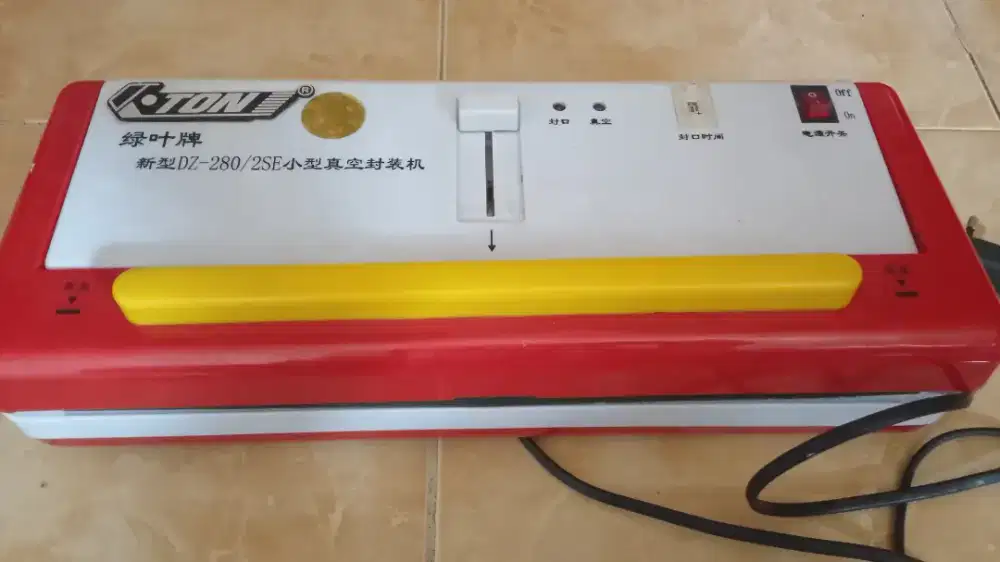 Mesin seal dan vakum