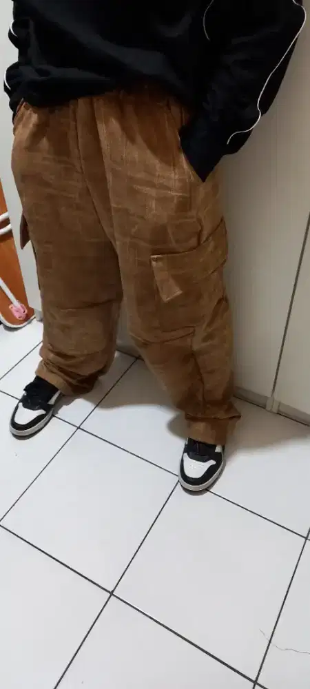 Tukang jahit celana dan baju