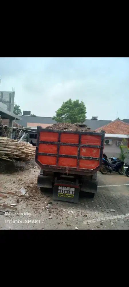 Jasa buang puing bangunan