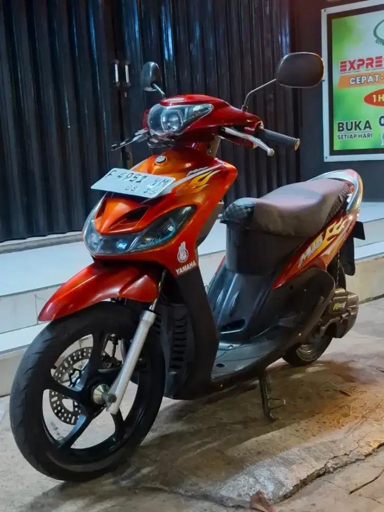 Mio smile tahun 2010 warna merah marun