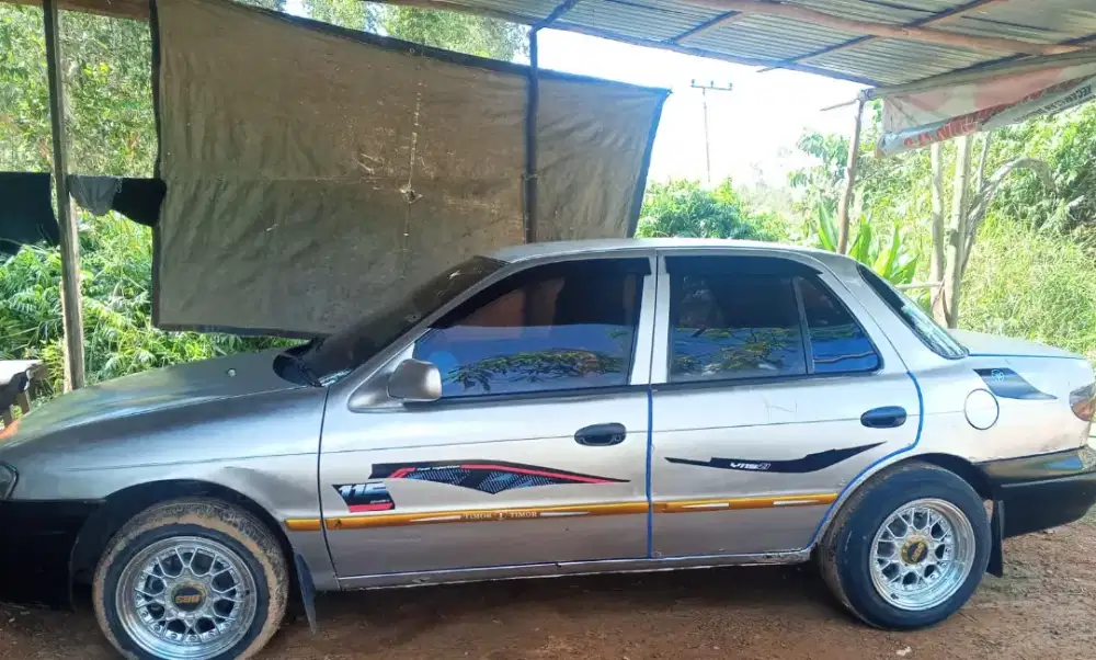 Mobil Sedan Timor