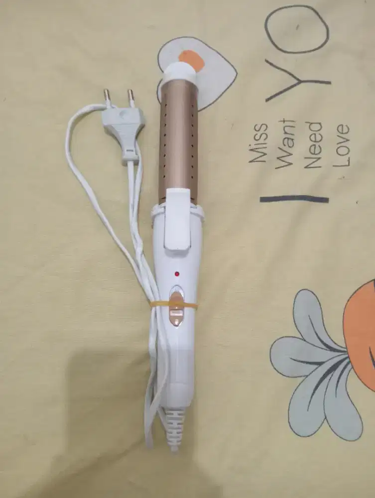 Catokan rambut 2-in-1, merek Nova (model NHC-809CRM)