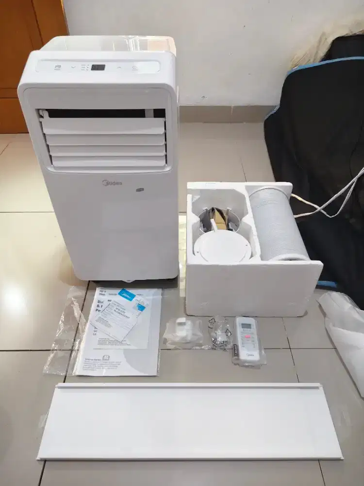 AC Portable Midea 1/2 PK