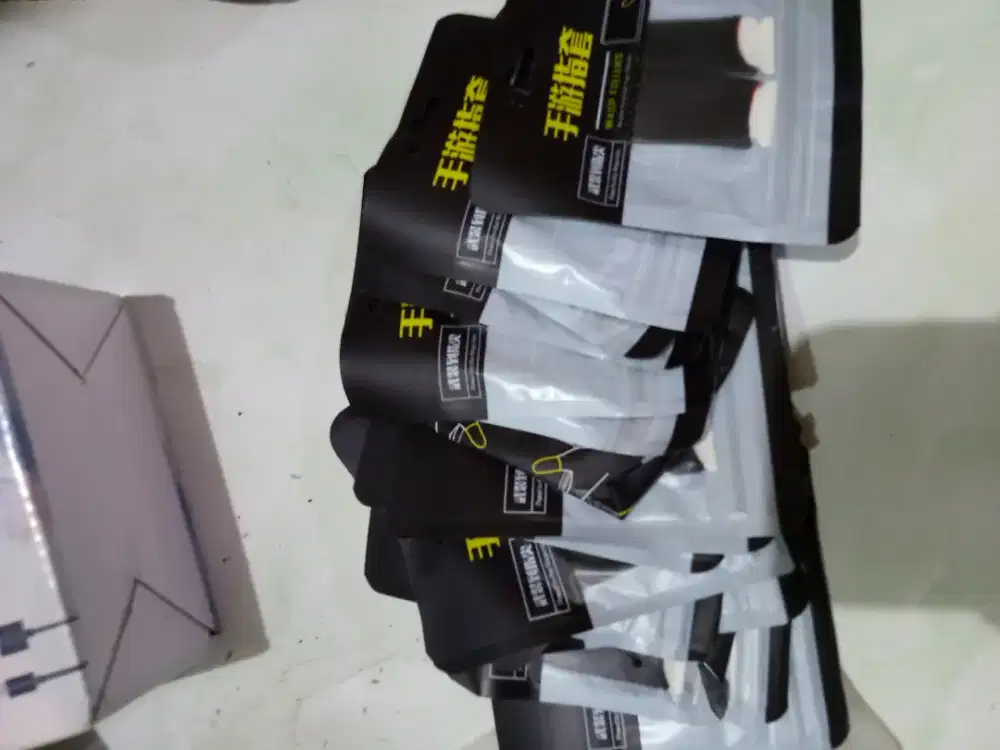 Sarung tangan jempol game