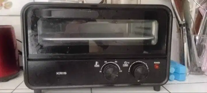 Compact oven toaster