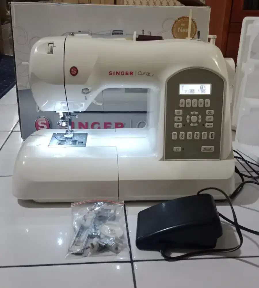 Mesin jahit portable