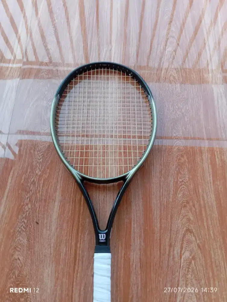 Raket tenis merk wilson hammer